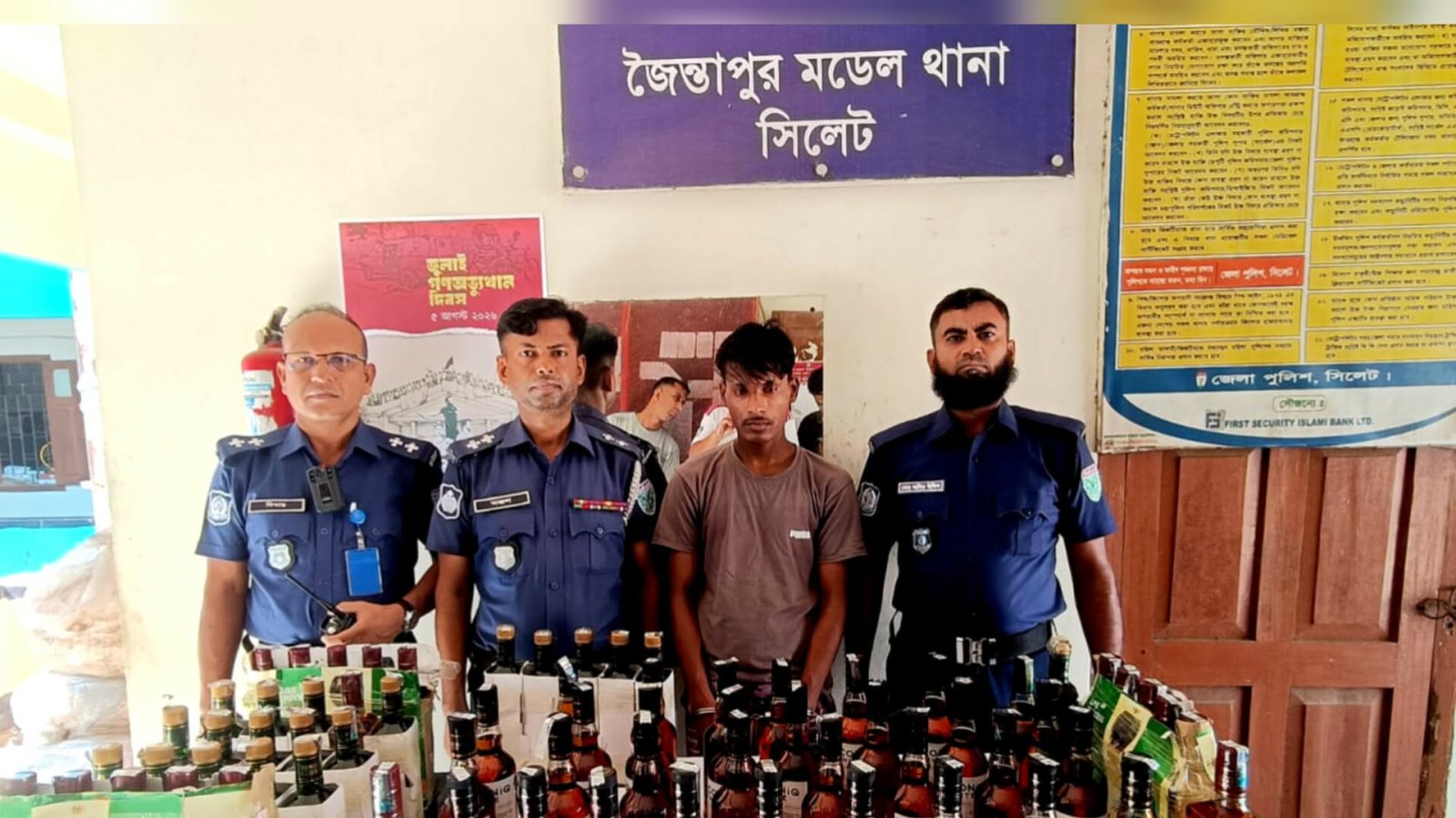 জৈন্তাপুরে বালুবাহী ড্রাম ট্রাকের গোপন চেম্বারে ১০২ বোতল বিদেশি মদ, আটক ১