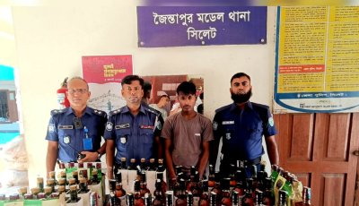 জৈন্তাপুরে বালুবাহী ড্রাম ট্রাকের গোপন চেম্বারে ১০২ বোতল বিদেশি মদ, আটক ১